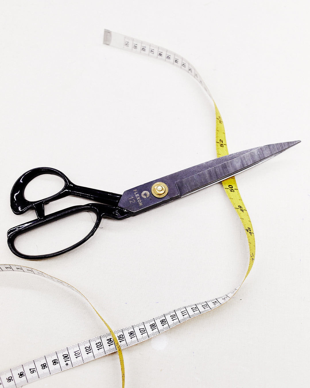 Scissors and tape measure used in Varana’s made-to-measure service 
