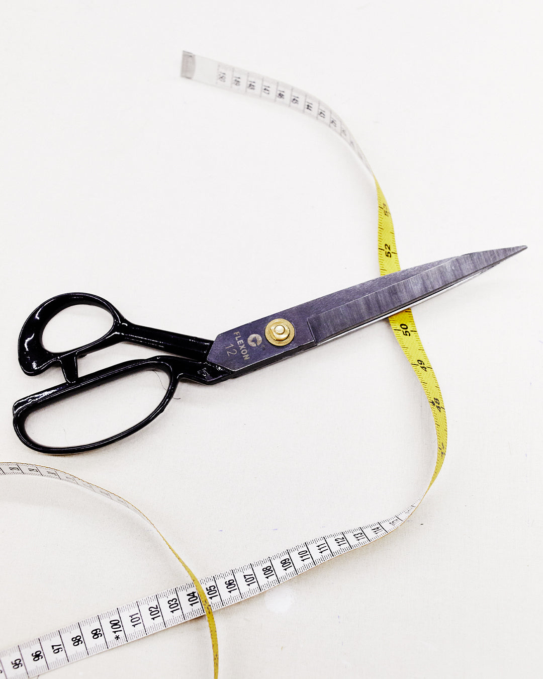 Scissors and tape measure used in Varana’s made-to-measure service